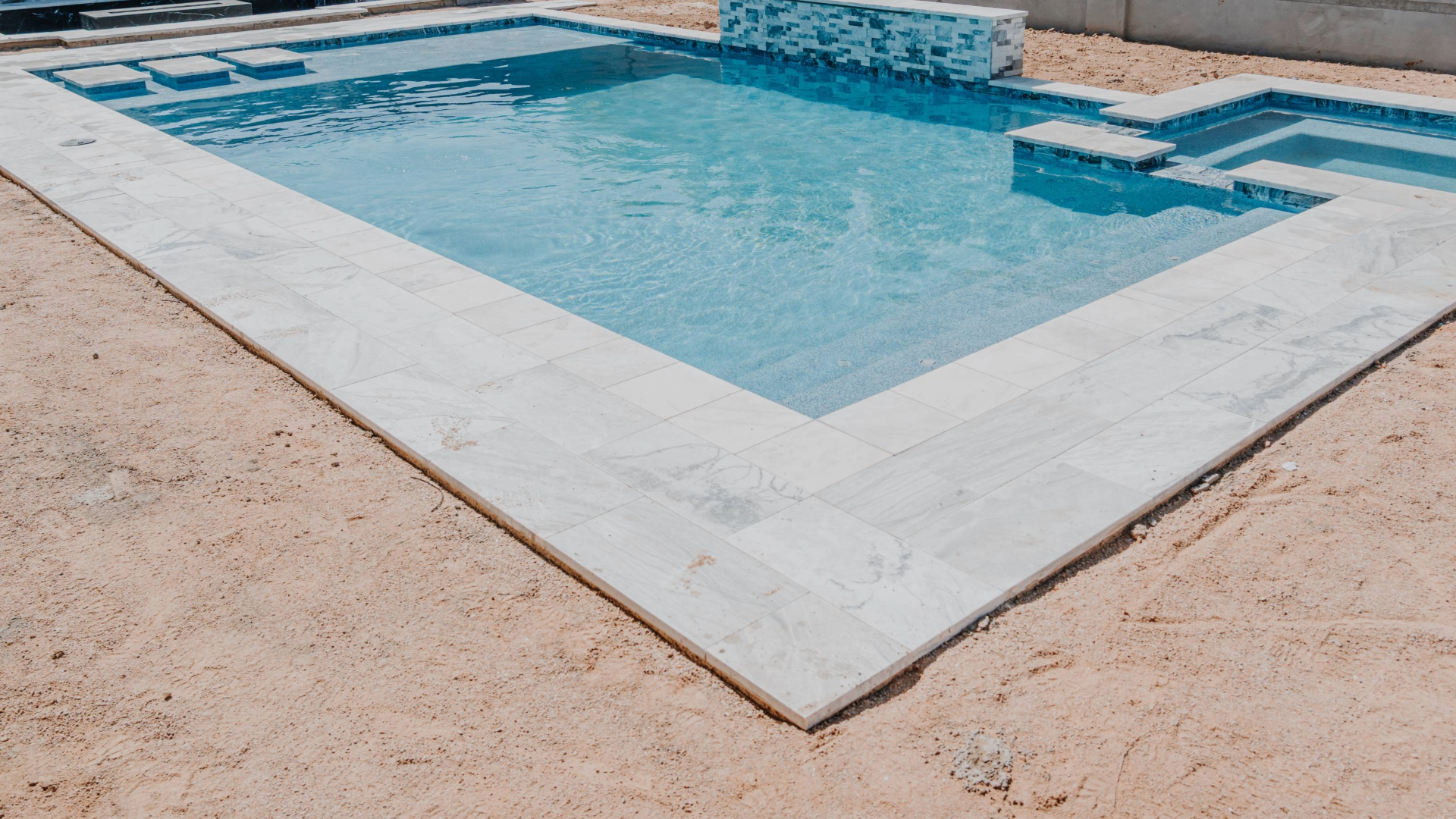 What are Pool Deck Replacement Cost by Material?